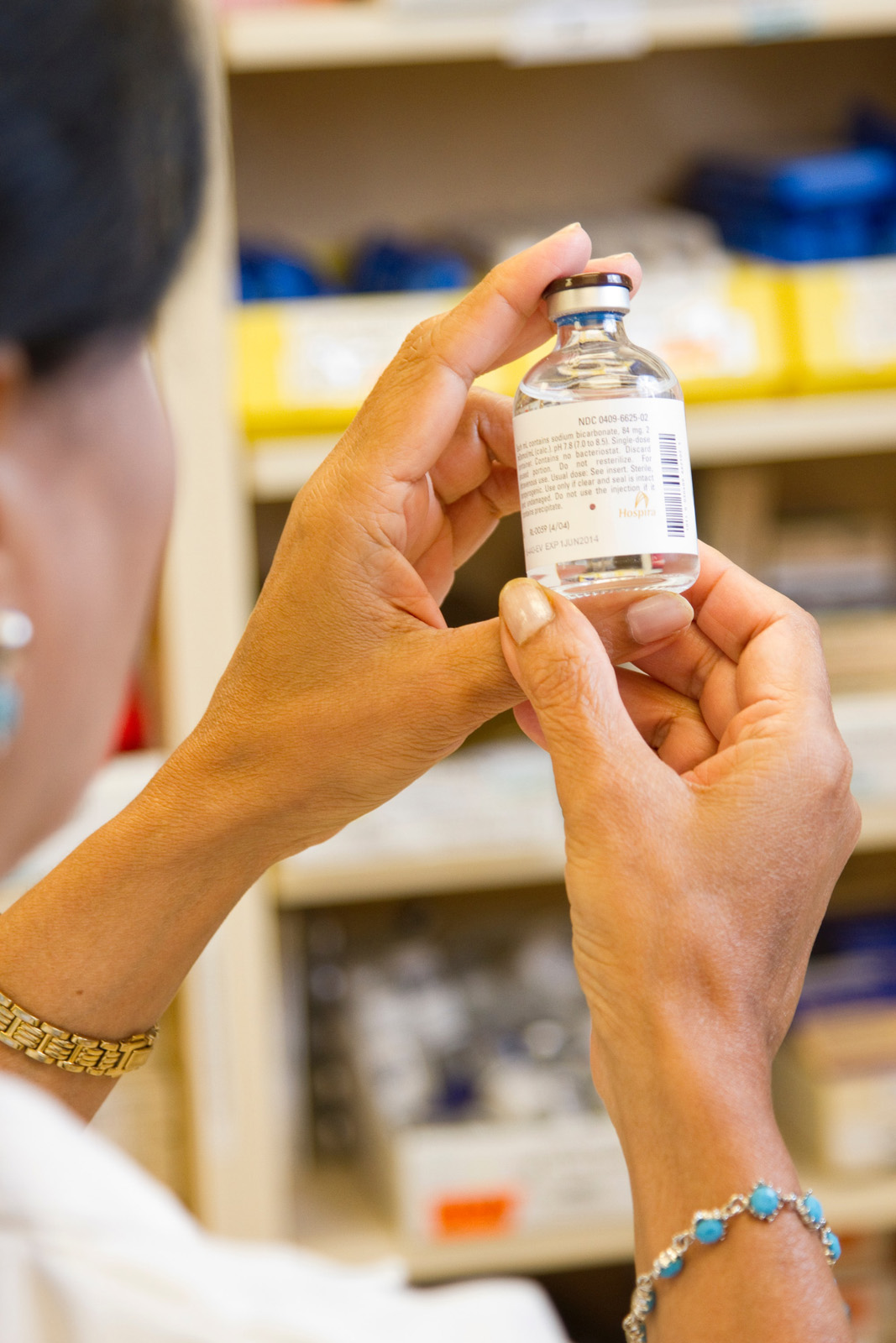 Doctor holding prescription medication