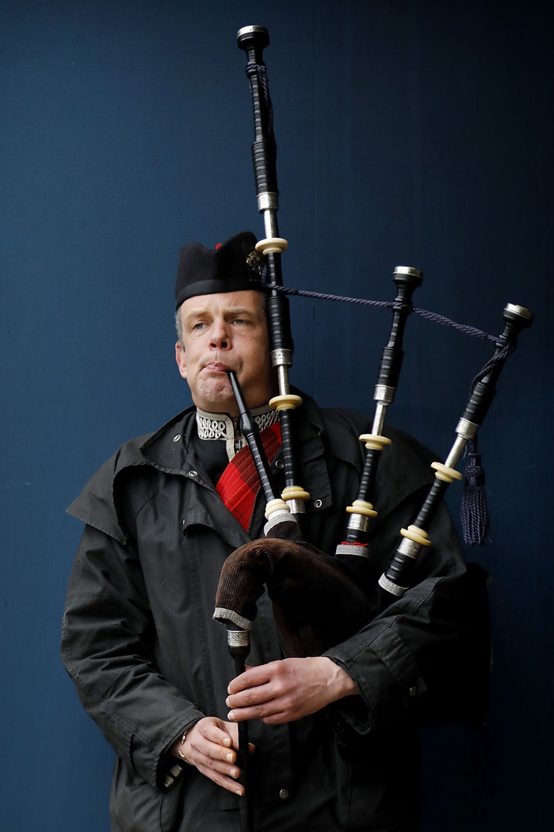 Piper Playing the Bagpipes