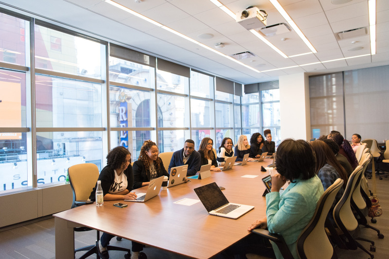 People sitting round a boardroom table