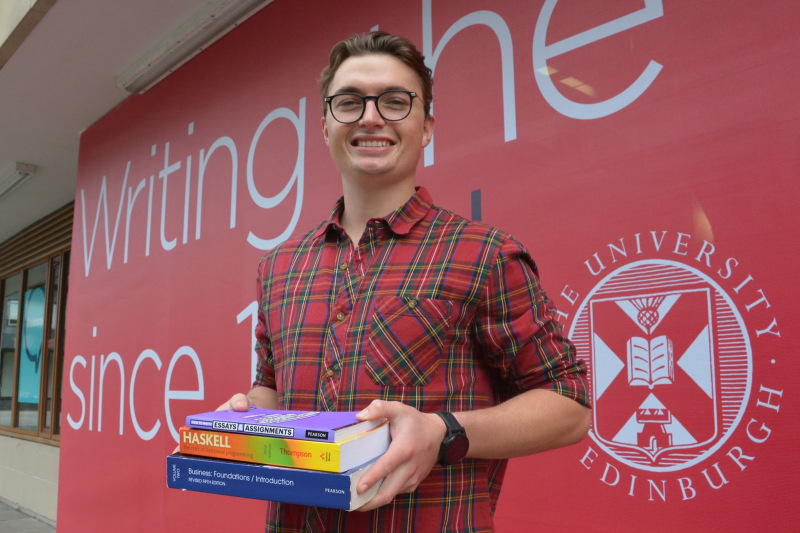 Tom Chapman outside the Business School