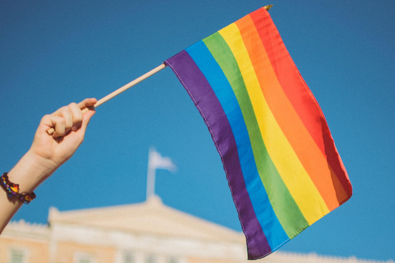 LGBT+ Flag in front of building