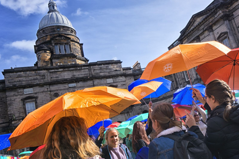 Welcome Week Event with Umbrellas in Old College Quadrangle