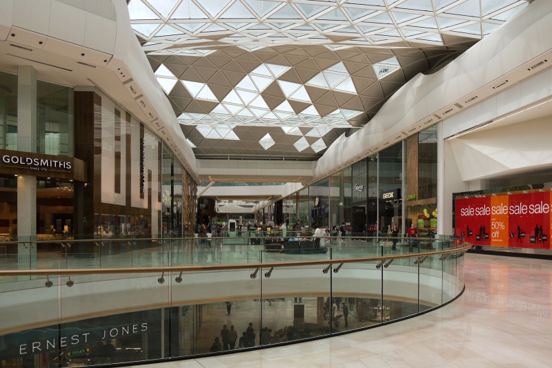 Shopping mall with few customers | Photo by Brett Jordan