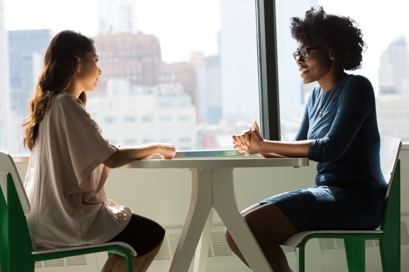 The organisational reproduction of inequality - two women in seat by a window