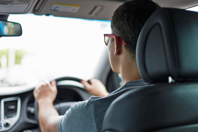 Man driving a car