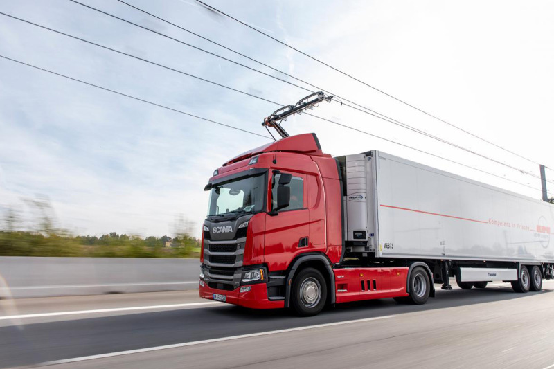 An electric HGV heads out on the highway