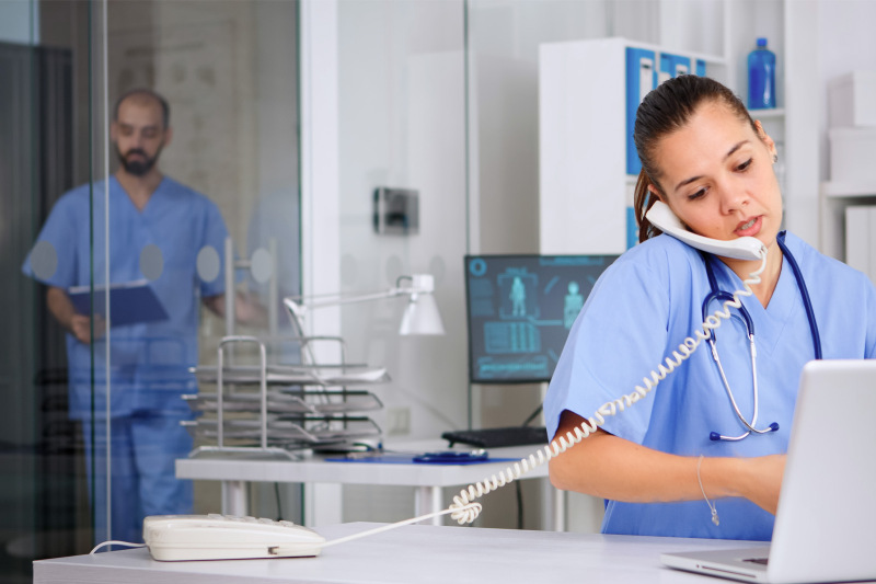 Hospital worker on the phone