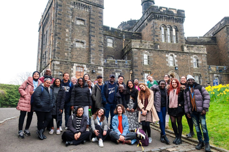 Group of 2022/2023 Chevening Scholars pictured at a UK monument