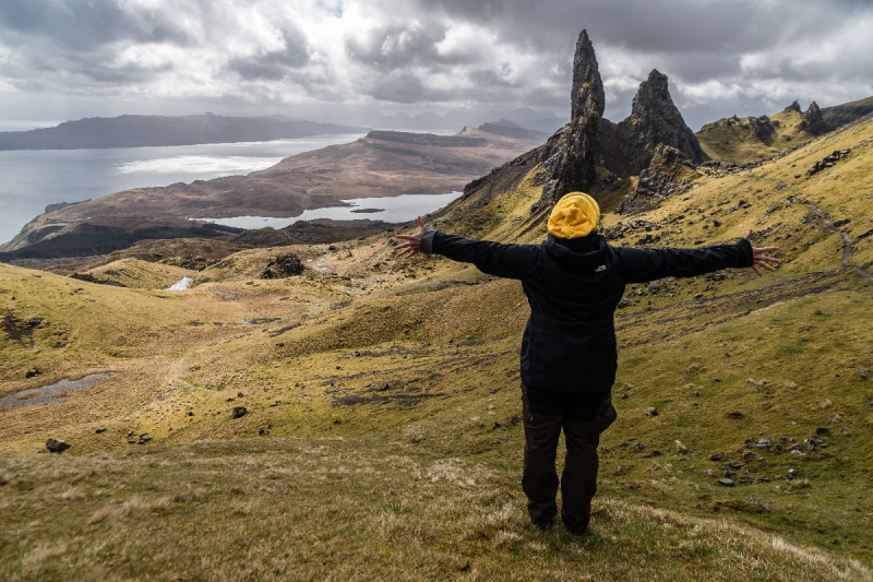 Person looking at Scottish hills and lochs