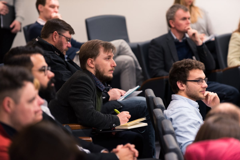 Students listening to discussion in seminar room | Photo by David P. Scott