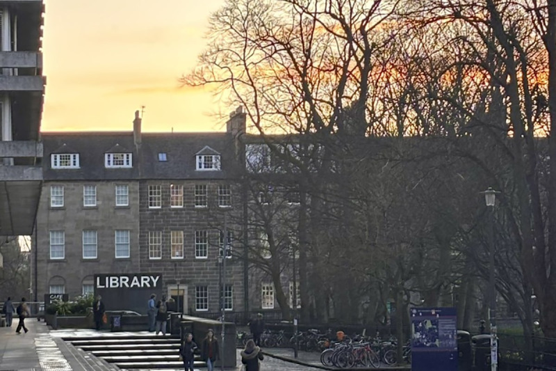 University of Edinburgh library with sunset backdrop