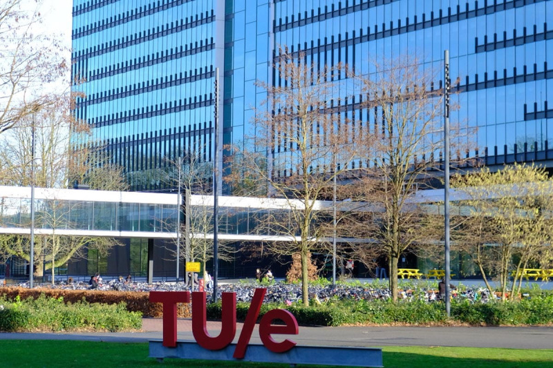 Outside image of the Eindhoven University of Technology sign and building 