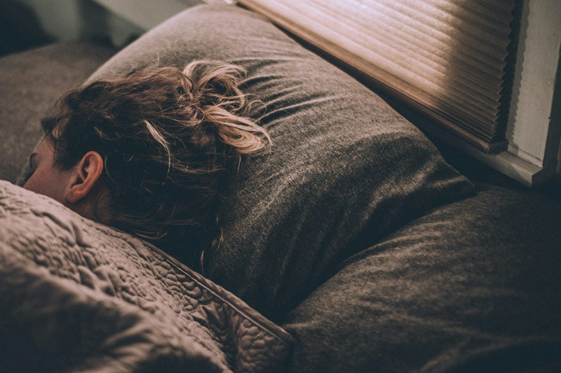 Someone asleep in bed (c. Greg Pappas)