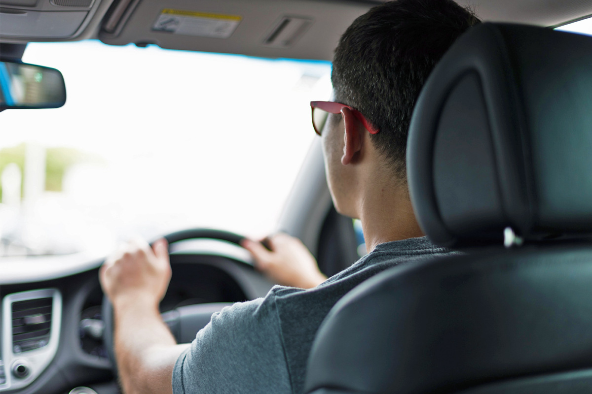 Man driving a car