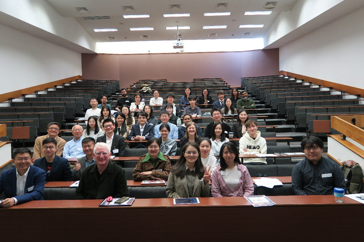 Attendees sitting in a lecture theatre at the 2024 Edinburgh World-Class Workshop in FinTech and Sustainable Finance