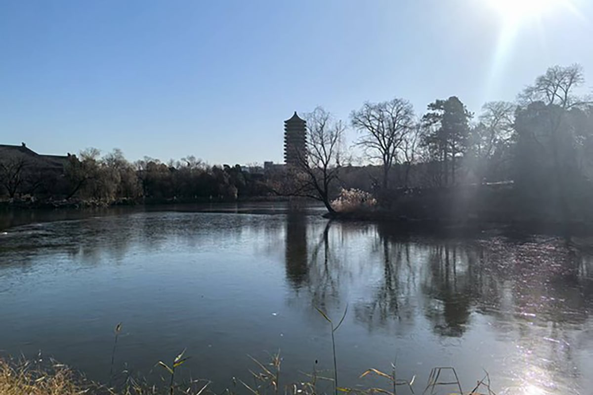 Frozen Weiming lake in Peking with Boya Pagoda in the background