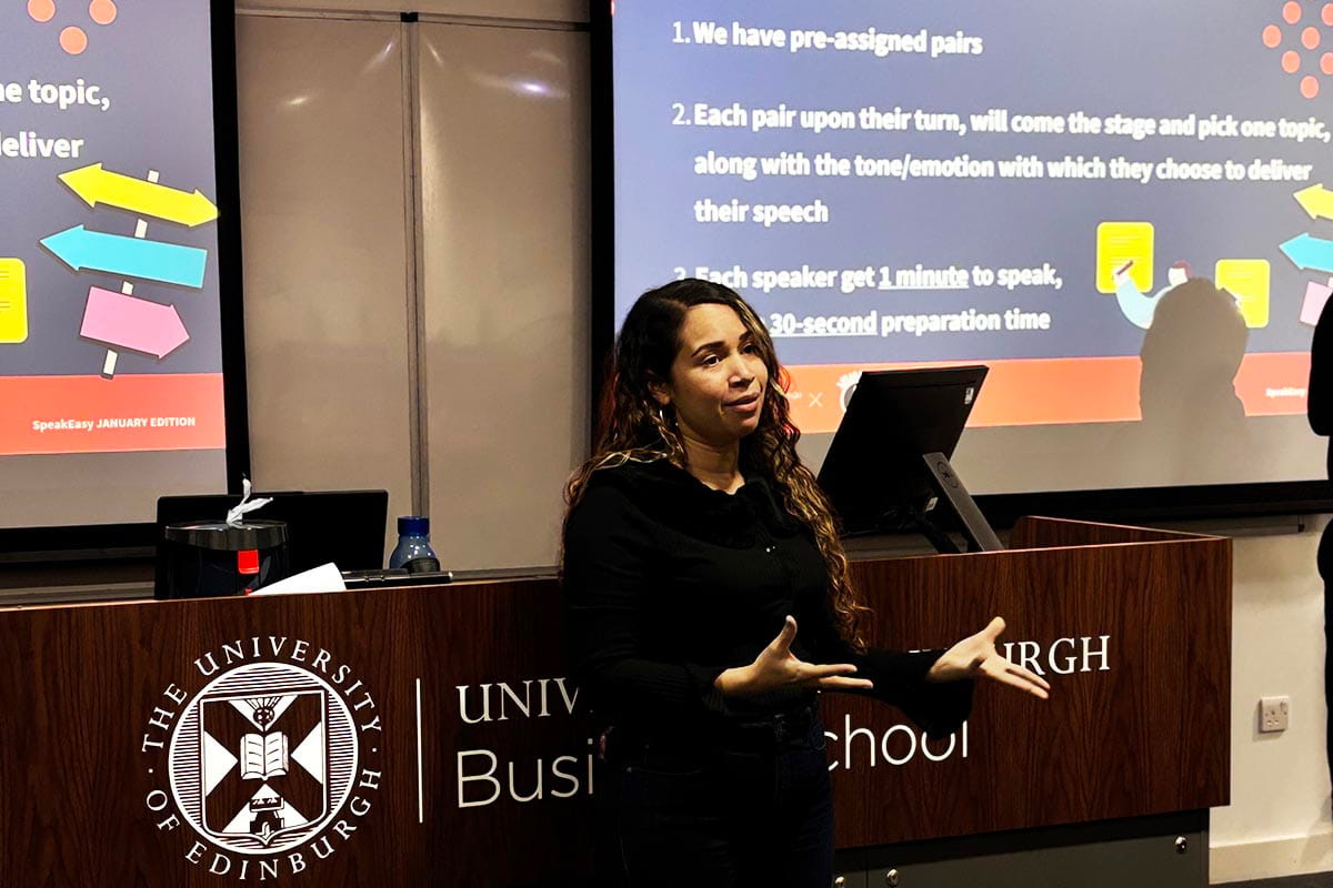Katherine Rodriguez Garcia presenting to an audience at a Speakeasy event  eventt 