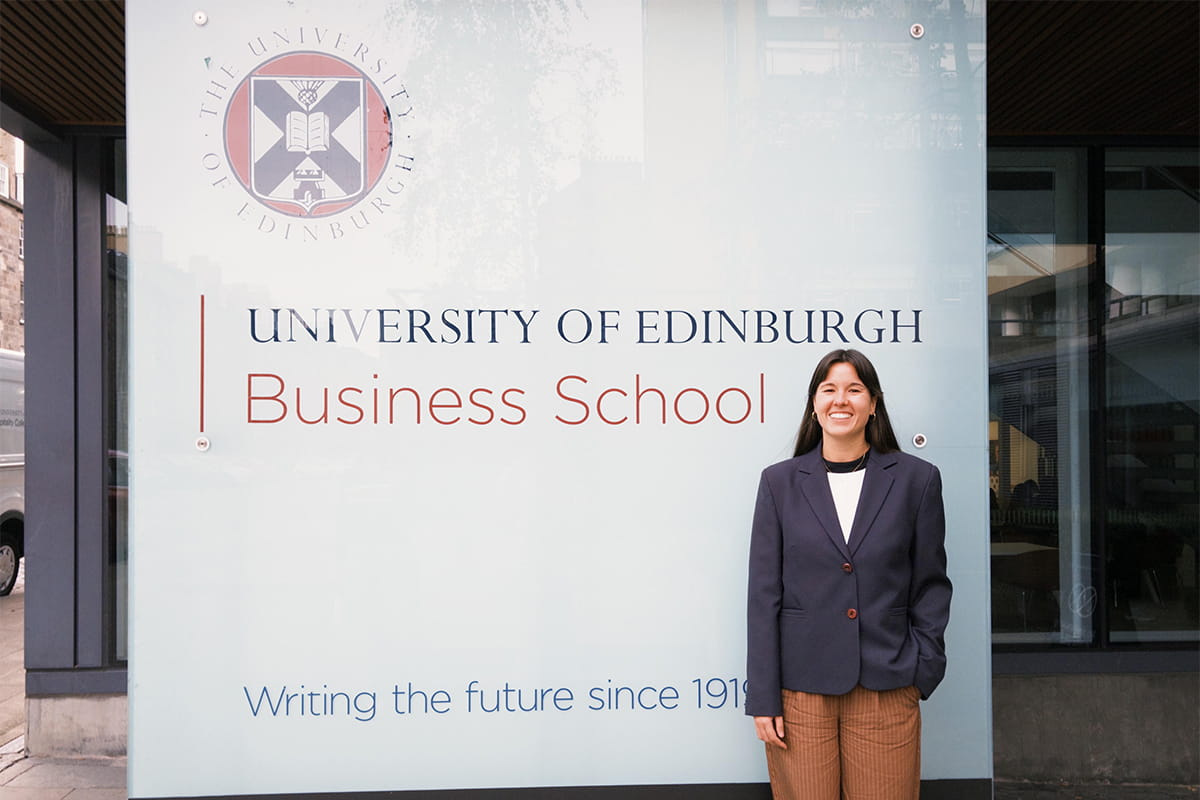 MBA student standing outside the University of Edinburgh Business School
