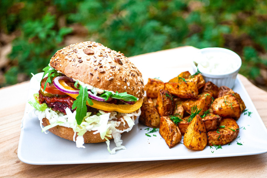 Plant-based burger, with a side of potato fries