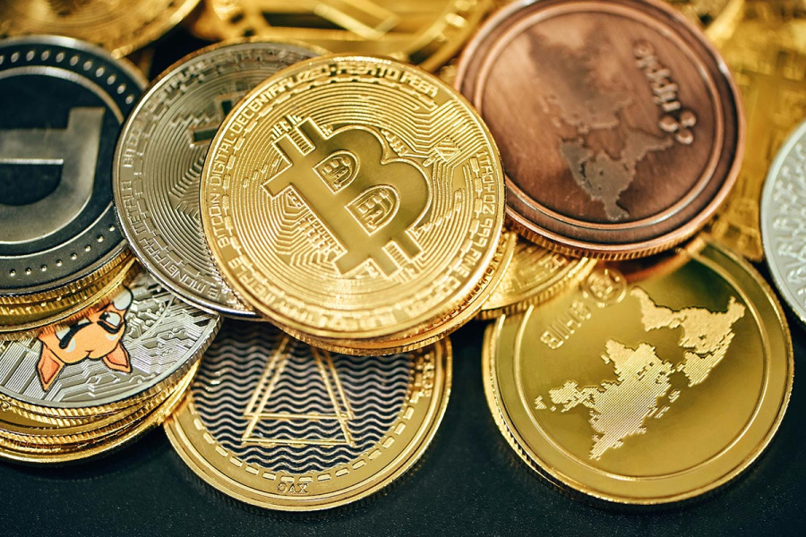 selection of coins including a Bitcoin